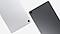 Two Galaxy Tab A11+ tablets are placed side by side, one grey and one silver, with their backs facing the viewer. The back camera lenses of both tablets are visible.