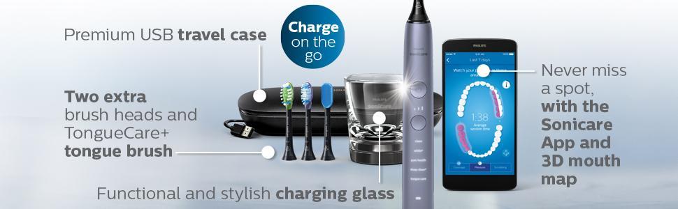 shows 3 brush heads, charging case and glass, app on phone and grey tooth brush handle