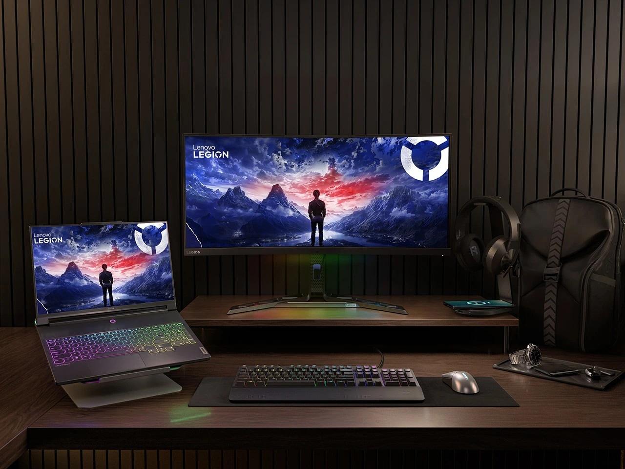 Legion 9i (16″ Intel), etrafında Legion aksesuarları ile çevrilmiş bir dizüstü bilgisayar standı üzerinde masada duruyor