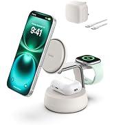Yeşil ekranlı iPhone'u ve Apple Watch'u gösteren çoklu cihaz desteğine sahip beyaz şarj istasyonu. Kablosuz şarj özelliği ve organize kablo yönetim sistemine sahiptir.