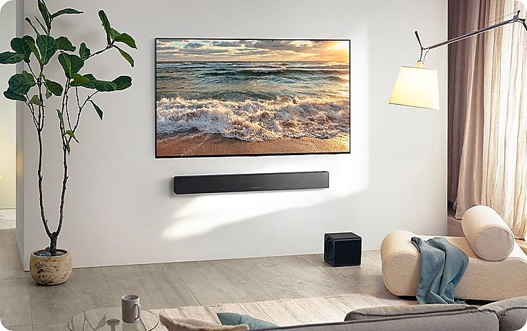QS700F and subwoofer with TV.