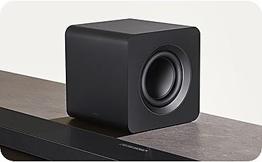 QS700F and subwoofer with TV.