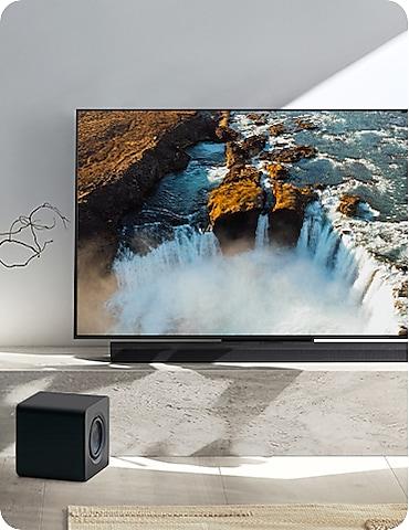QS700F and subwoofer with TV.
