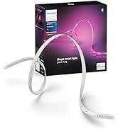 Philips Hue Light Strip ürün ambalajı ve mor arka plana karşı kavisli beyaz LED şeritler, esnek monte edilebilir.